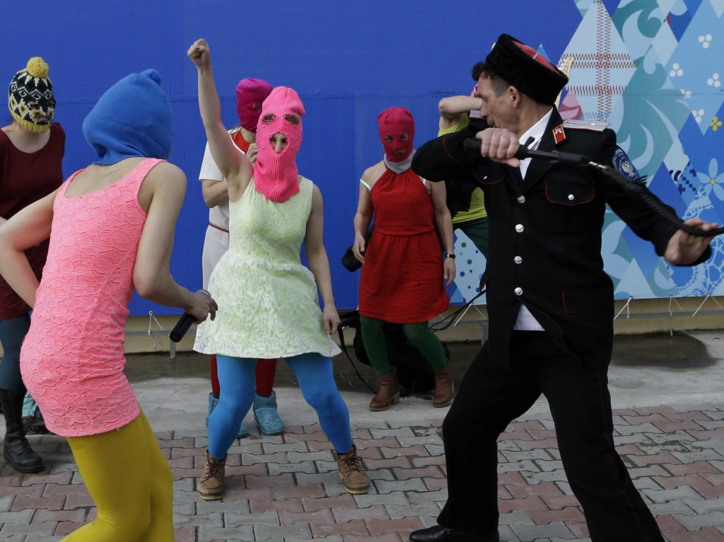 Pussy Riot attacked by whip-wielding Cossacks in Sochi.