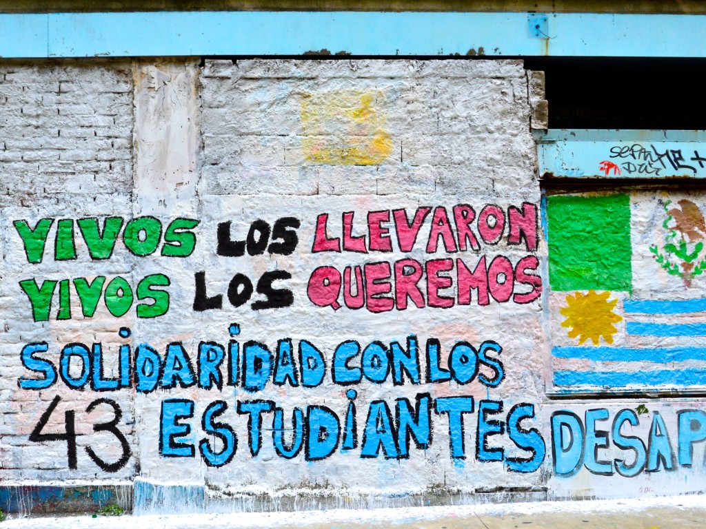 "They were taken alive, we want them alive. Solidarity with the 43 students," reads a work of street art in Mexico City (Wikimedia Commons.)