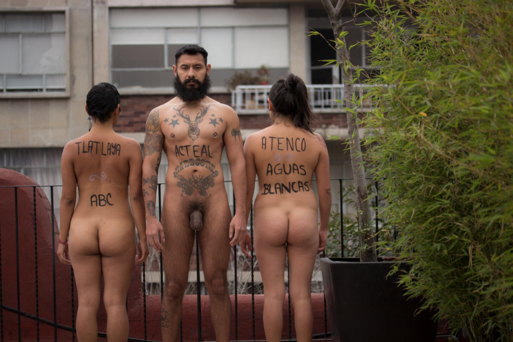 Protestors' bodies are adorned with the names of cities which experienced similar massacres to that which ocurred in Iguala (ponerelcuerpo.tumblr.com)