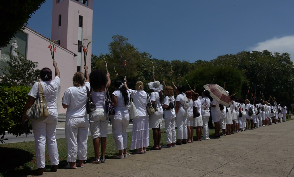 A group of Ladies in White in a 2012 demonstration in Havana. Bruguera set out to study the group and the government's reactions in preparation for a free speech bill (Wikimedia Commons.)