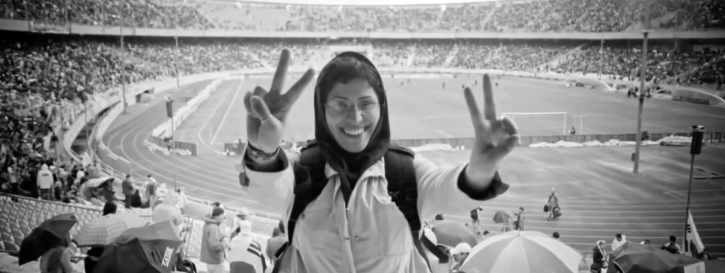 A woman defiantly gives the peace sign in the music video for “Shere Rahai,” or "Song of Freedom." The video, published online, has numerous women demonstrating their support of the lyrical message, "We are happy, joyful and full of laughter Even though we are imprisoned" 