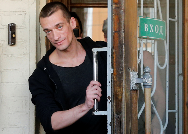 Pyotr Pavlensky exits a Moscow court a free man after over six months behind bars (Reuters).